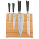 A Mercer Culinary Z&#252;M&#174; knife set on a bamboo magnetic board.
