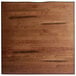 A Lancaster Table & Seating square wood table top with black lines on the edges.
