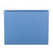 A blue Smead hanging file folder with a repositionable poly tab.