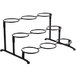 A Libbey black metal 3-tier round display stand.