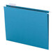 A teal file folder with white tabs.