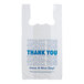 A white plastic t-shirt bag with the message "Thank You" in blue.