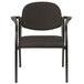 A Eurotech Dakota black arm chair with a metal frame.