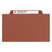 A brown Smead SafeSHIELD legal classification folder with a red name tag.