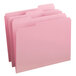A close-up of a pink Smead file folder with reinforced 1/3 cut assorted tabs.
