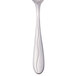 A Libbey stainless steel teaspoon with a curved silver handle and white tip.