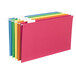 A close-up of a group of Smead legal size file folders in various colors.