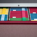 Several colorful Smead legal size hanging file folders in a row.