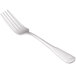 A World Tableware Columbus stainless steel utility/dessert fork with a white handle.