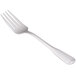 A World Tableware Columbus stainless steel salad fork with a white handle.