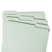 A stack of Smead letter size file folders with 1" expansion and 1/3 cut assorted tabs.