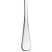 A Libbey stainless steel dessert spoon with a long handle.