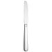 A Libbey stainless steel dinner knife with a serrated solid silver handle.