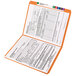 An open orange Smead file folder with documents inside.
