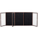 A black rectangular message board with a walnut frame and three doors.