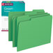 A package of Smead green file folders with blue labels.