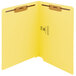 A yellow Smead Shelf-Master folder with 2 brown fasteners on the end tab.