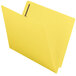 A yellow Smead Shelf-Master file folder with 2 metal fasteners on the end tab.