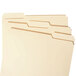 A close-up of Smead file folders with four different colored tabs.