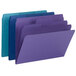A close-up of several Smead file folders in assorted colors with tabs.
