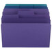 A row of Smead SuperTab letter size file folders in assorted colors including purple and blue.