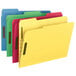 A close-up of several Smead letter size fastener folders in pink and yellow.