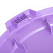 A Carlisle purple plastic lid for a round trash can.