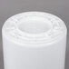 A white plastic container with a round white lid.