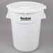 A white plastic Continental Huskee round trash can with a white lid.
