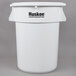 A white plastic Continental Huskee trash can with black text on the side.