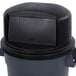 A black Carlisle Bronco trash can lid with a hinged door.