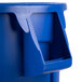 A blue Rubbermaid Brute recycling can with a lid.