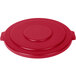 A red plastic Carlisle Bronco lid for a round trash can with handles.