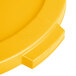 A close up of a yellow Carlisle Bronco trash can lid with a plastic handle.
