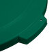A green Carlisle Bronco plastic lid with a hole.