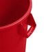 A red Carlisle Bronco round plastic trash can with a handle.