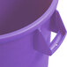 A close-up of a purple Carlisle Bronco trash can with a handle.