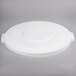 A Carlisle white plastic lid on a gray background.