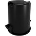 A black Carlisle round plastic trash can with a lid.