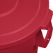 A red plastic lid for a Carlisle Bronco trash can.