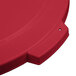 A red plastic Carlisle Bronco trash can lid with a plastic handle and holes.