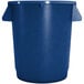 A blue plastic Carlisle Bronco trash can with two handles.