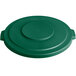 A green plastic lid with a circle on a white background.