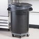 Rubbermaid BRUTE 32 Gallon Black Executive Round Trash Can with Lid and Dolly Main Thumbnail 4