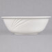 A CAC Garden State white porcelain bowl with a wavy design on it.