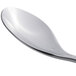 A silver Chef & Sommelier stainless steel teaspoon with a logo on the handle.
