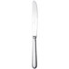 A silver Chef & Sommelier stainless steel dinner knife with a white handle.
