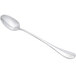 A silver Chef & Sommelier iced tea spoon with a white handle.