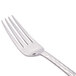 A Libbey stainless steel dinner fork with a silver handle.