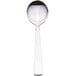 A silver Libbey heavy weight bouillon spoon with a white handle.
